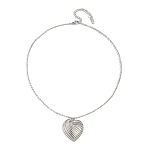 Detailed view of silver heart pendant necklace with textured fold pattern on white backdrop
