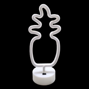 Detail of LED pineapple neon light with white round base and power toggle switch
