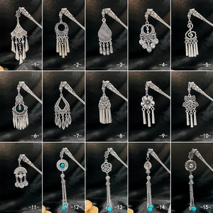 Detailed grid of fifteen vintage silver hairpins featuring turquoise beads and tassels