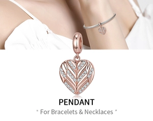 Rose gold heart pendant with cubic zirconia for bracelets and necklaces closeup