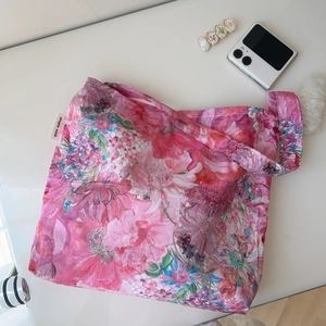 Floral cotton tote bag with pink flower print and stylish lifestyle accessories