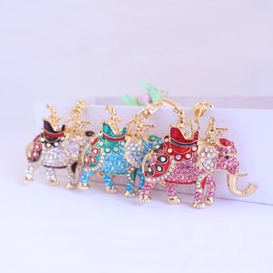 Cute rhinestone elephant keychain accessories in pink, blue and black with gold alloy base