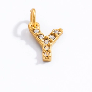 Macro shot of 18K gold plated Y letter pendant with sparkling zircon inlay details