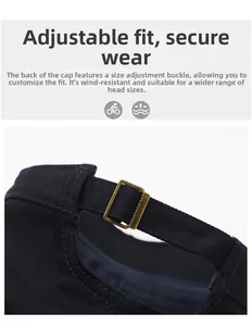Detailed macro view of the adjustable bronze metal buckle on a twill cotton flat top cap