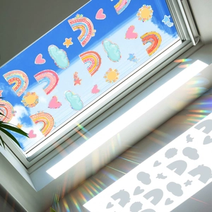 Rainbow sun catcher window stickers showing colorful spectral patterns on window sills