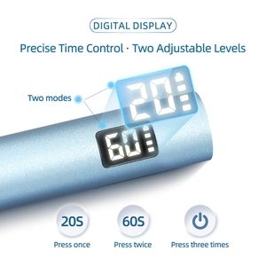Portable handheld LED nail lamp with digital timer display and light blue metallic finish