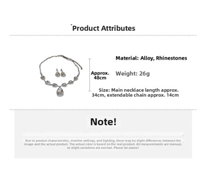 Detail view of teardrop necklace and earrings set with crystal rhinestones and sizing info