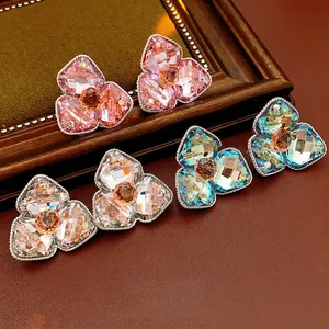 Luxe rhombic flower stud earrings with sparkling crystals in pink, gold and blue shades