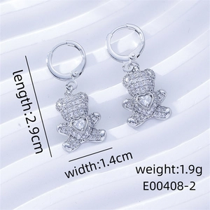 Detail view of silver teddy bear earrings with zircon pavé showing 2.9cm length and weight