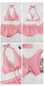 Three-piece pink halter bikini set with high-waisted shorts and bow details for beachwear