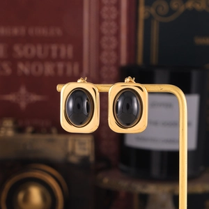 Vintage gold-plated titanium steel earrings with oval black glass stone in square frames