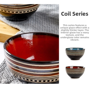 Close-up of Japanese style ceramic bowls with reactive glaze and white spiral textures