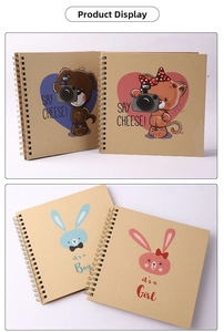 Detail of 6-inch spiral kraft paper scrapbook with cute cartoon camera and rabbit designs