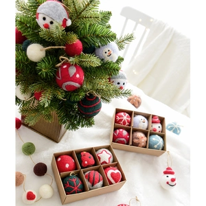 Handmade wool felt Christmas tree ornaments set with snowman and snowflake designs