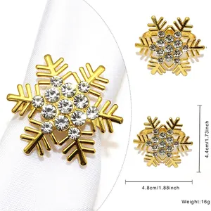 Detail of gold snowflake napkin ring with rhinestones showing dimensions and weight