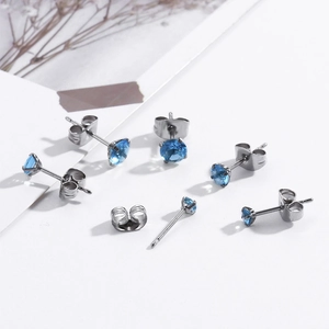 Set of multiple size round sky blue zircon stud earrings in silver stainless steel
