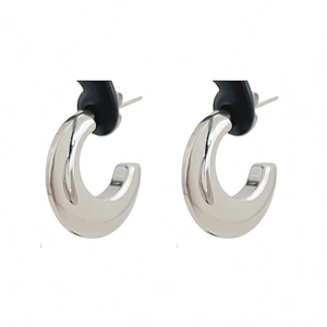 Elegant silver C-shaped stainless steel hoop earrings with polished metallic finish