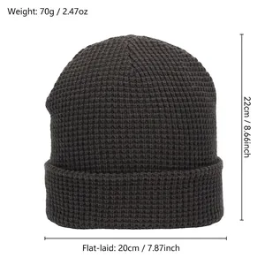 Deep grey waffle knit beanie with cuffed design for winter warmth on white background