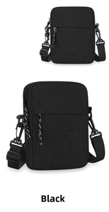 Detailed view of black waterproof chest bag with adjustable strap and paracord zipper