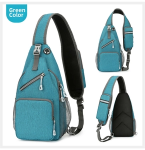 Detail of green outdoor crossbody chest bag showing texture, zippers and side mesh pocket