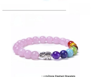 Detail view of 8mm pink crystal beads and silver elephant charm yoga bracelet