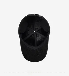 Close-up of winter baseball cap featuring warm fleece lining and foldable ear flaps