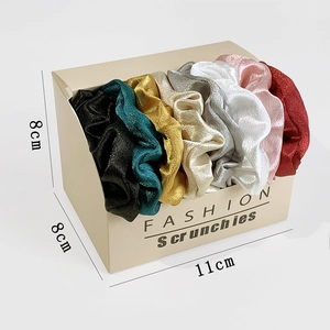 Set of 7 multi-color satin scrunchies in a premium cream gift box measuring 11x8x8cm
