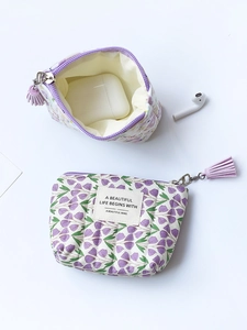 Cute purple floral quilted coin purse with zipper tassel and internal storage space