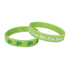 Close-up of green silicone wristbands with shamrocks and Kiss Me I'm Irish text