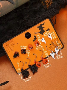 Detailed view of Halloween earring set with sizes for pumpkin and ghost charms