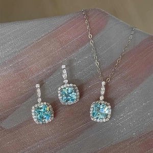 Square light blue gemstone jewelry set with halo diamond pendant necklace and earrings