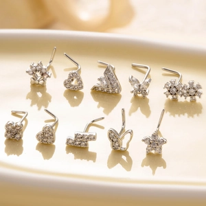 Silver nose studs collection with butterfly, heart and flower zircon designs in metal