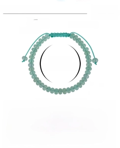Detailed view of handmade green aventurine crystal bead bracelet with adjustable woven cord