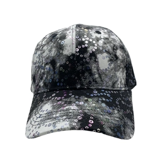 Detail of marble tie-dye baseball cap with iridescent sequins and premium stitching