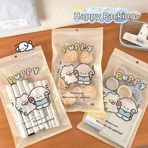 Detail showing versatile use of cute puppy theme frosted resealable bags for stationery