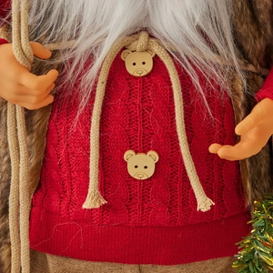 Standing Santa Claus doll in red knitted sweater with decorative wooden bear buttons