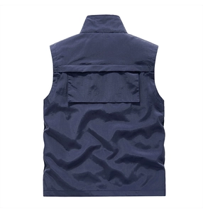 Detail view of the back large pocket on a navy blue windproof outdoor functional vest