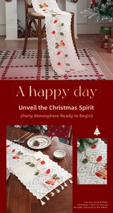 Detail of Christmas table runner featuring bell embroidery and white lace tassels