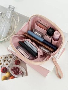 Pink waterproof mini makeup pouch with zipper closure and portable handle for cosmetics