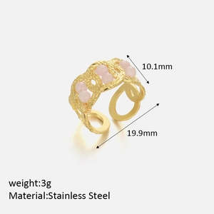 Detailed view of irregular hollow gold ring with six pink beads and size dimensions