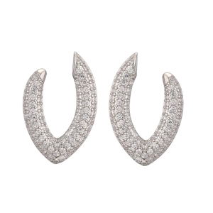 Detailed view of silver U-shaped earrings featuring luxury pave-set clear zircons