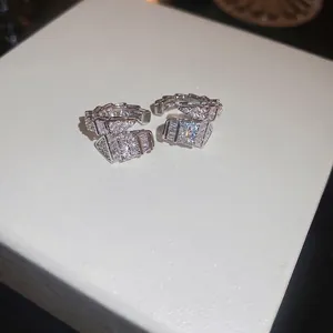 Silver snake-shaped C-style ear cuff with sparkling zircon micro-pave setting