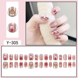 Faux ongles œil de chat rose avec feux d'artifice festifs et motifs de dessins animés