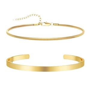 Golden double-layer set featuring a flat snake chain and a sleek polished open cuff bracelet