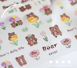 Macro detail of KX101 bear and tulip nail stickers with matte finish and fine printing