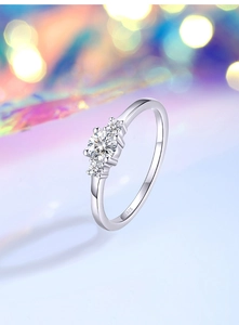 Detailed close-up showing the S925 hallmark on silver ring with sparkling Moissanite stones