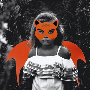 Detail of orange felt bat wings and cat mask set for children Halloween cosplay costumes