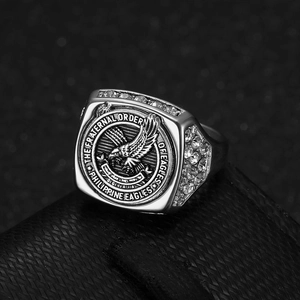 Macro view of Philippine Eagle seal ring featuring sparkling rhinestones and silver finish