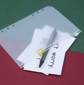 Translucent frosted PVC zipper pouch with binder holes for A6 notebooks and pens