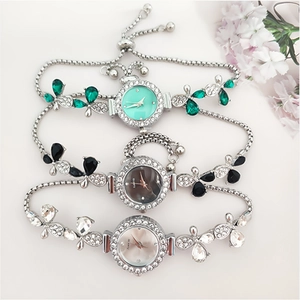 Three elegant crystal leaf bracelet watches in silver, green and black with slide buckles